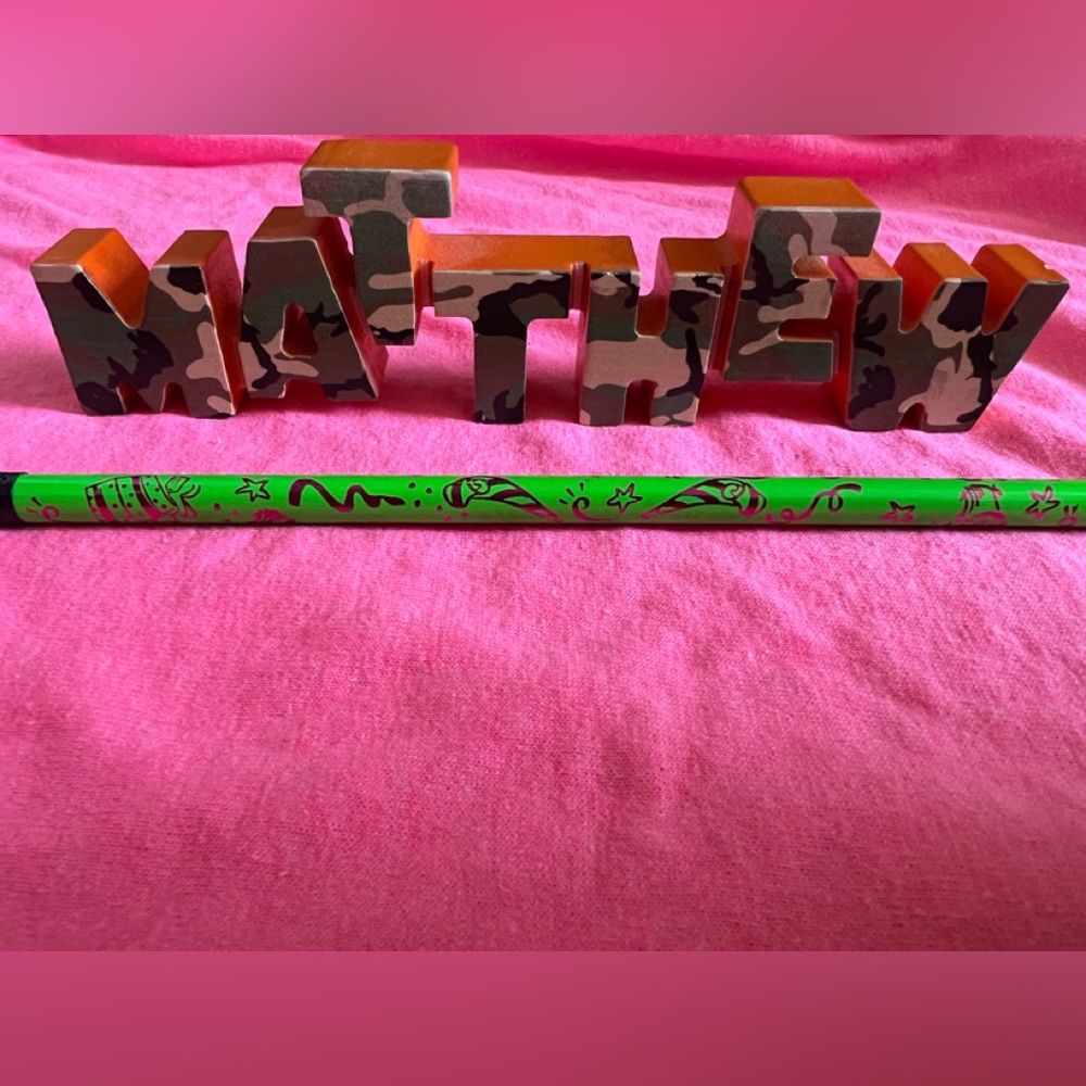 MATTHEW blocked out art work letter name display